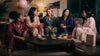 Adult friends enjoying a natural bachelorette pajama party with coordinated pajamas snacks and simple decorations
