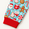 Close-up of the red ribbed cuff on the sleeve of the aqua cocoa mug and cookie print pajama top