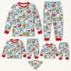 Flat lay of matching adult, kid and baby aqua cocoa mug and cookie pajama sets with a pet bandana