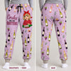 Personalized wine sweatpants front and back: Corks Are For Quitters quote and named cartoon woman on the front, wine bottle pattern on the back
