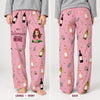 Personalized wine lounge pants front and back: Just A Woman Who Loves Wine quote and named cartoon woman on the front, wine bottle pattern on the back