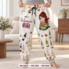 Close-up of personalized wine pants showing the quote, the cartoon woman and her name on the wine bottle label