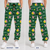 Front and back view of green personalized softball sweatpants with name, number, bows and hearts