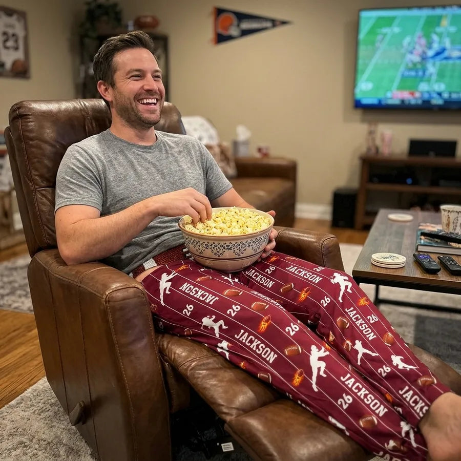 Man relaxing on game day wearing Custom Funny Football Pinstripe Pajama Pants